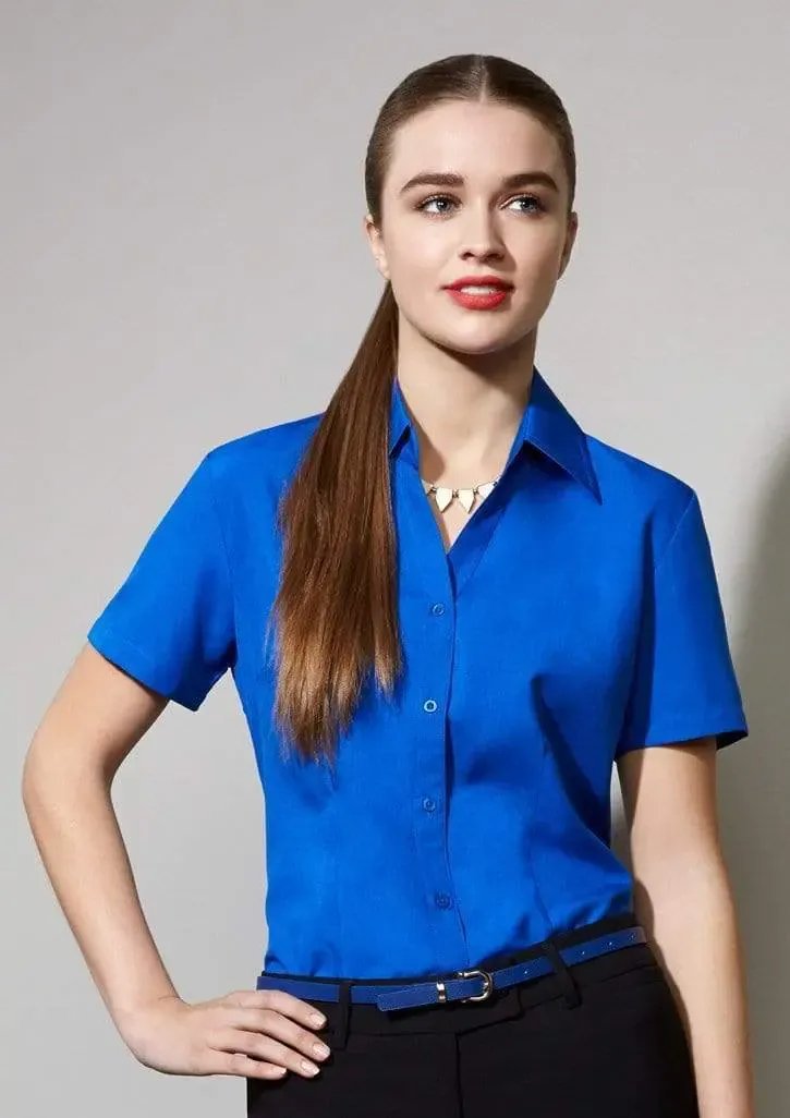 Girl wear blue shirt in formals